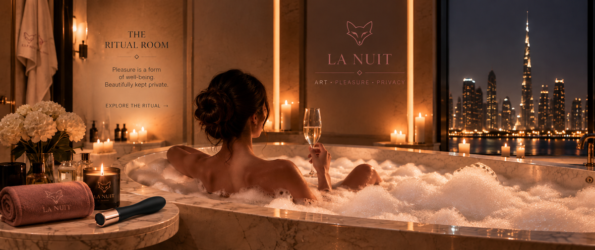 The Ritual Room: a woman in a candlelit bath with a glass of champagne, city lights behind, La Nuit