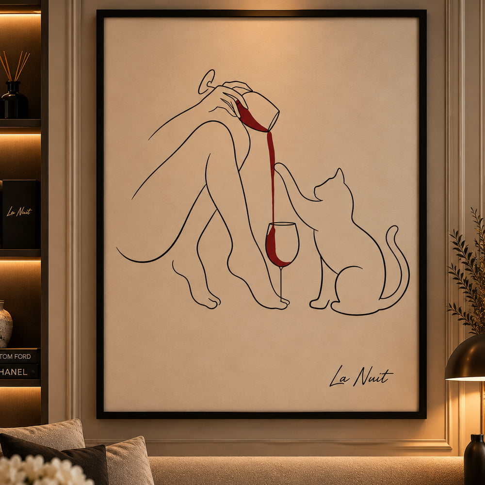 Wine Cat framed line art showing a reclining figure pouring red wine beside a cat, in a black frame.